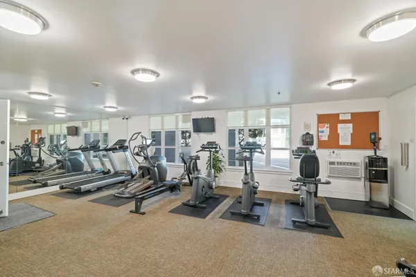 a view of a room with gym equipment