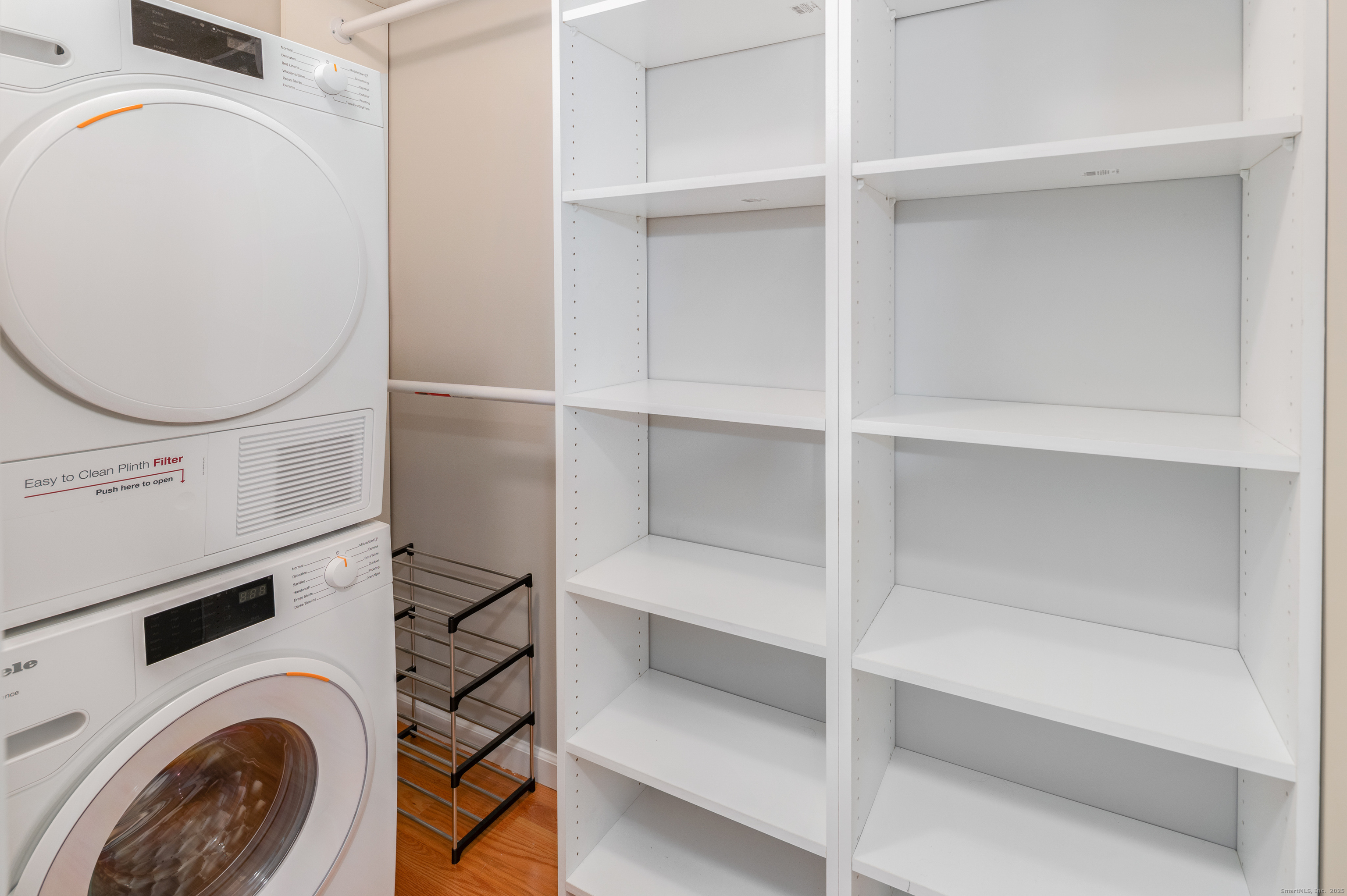 596 Glenbrook Road, Unit 36 Stamford, CT 06906 - Photo 14 of 25 a utility room with dryer and washer