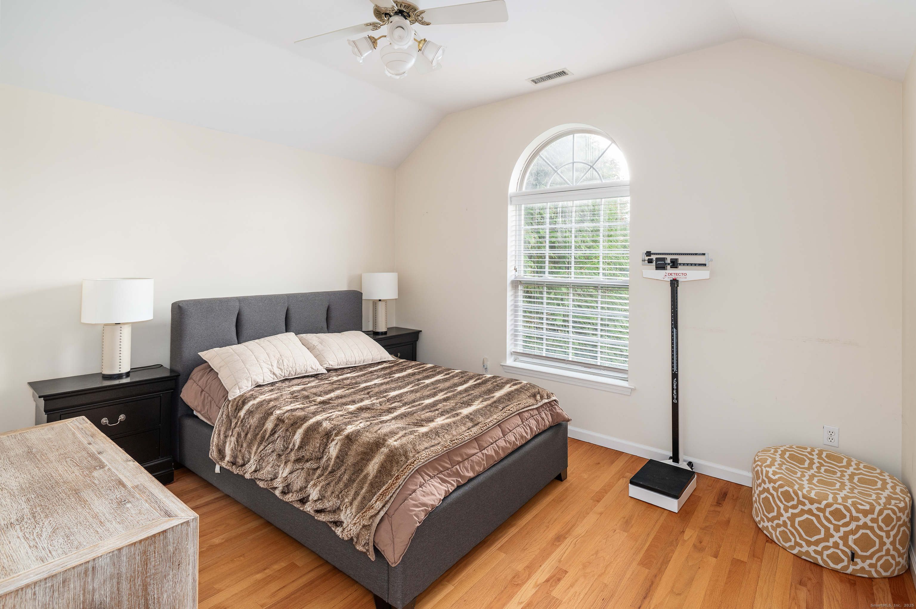 596 Glenbrook Road, Unit 36 Stamford, CT 06906 - Photo 15 of 25 a bedroom with a bed and a window