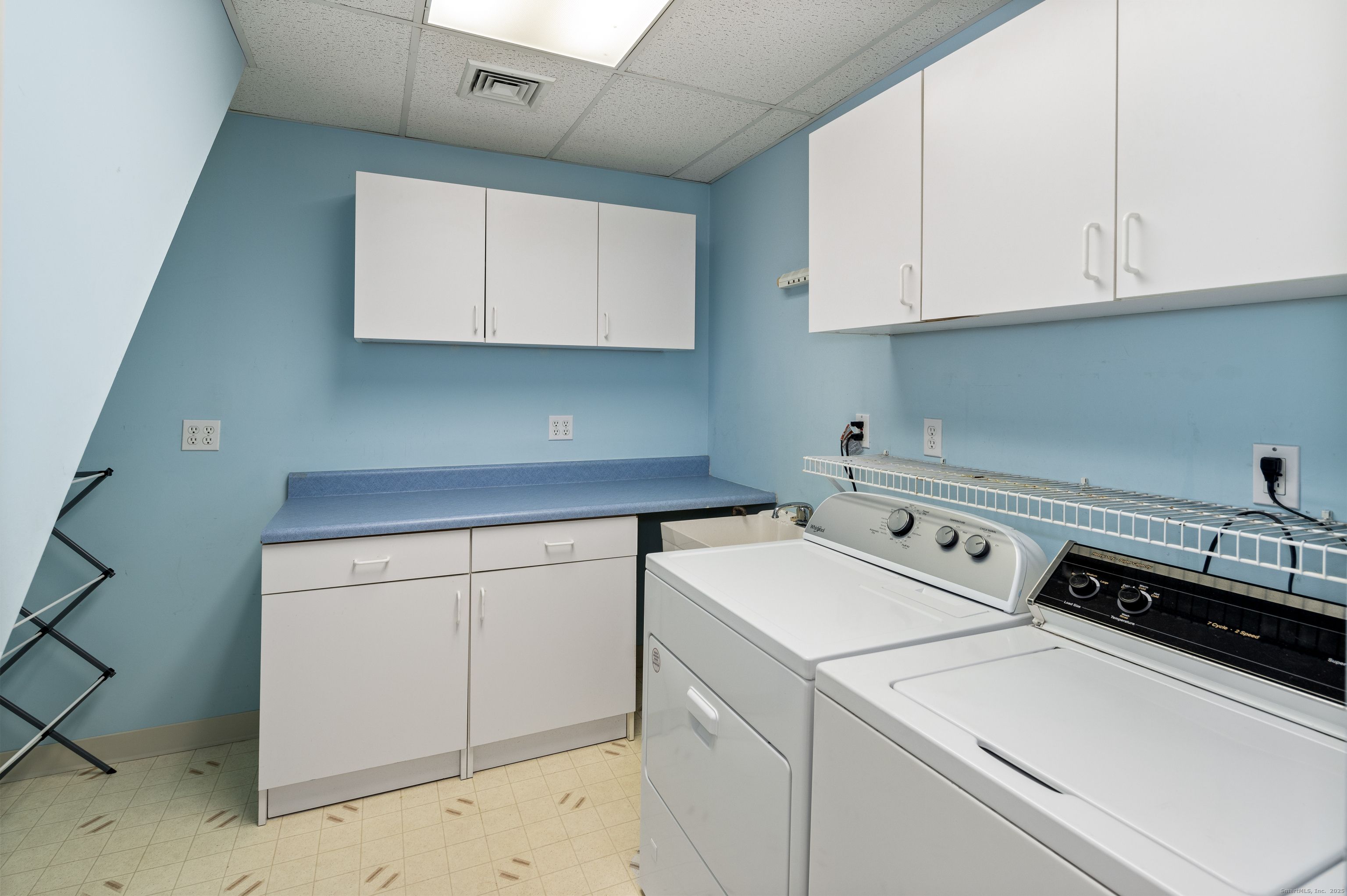596 Glenbrook Road, Unit 36 Stamford, CT 06906 - Photo 19 of 25 a utility room with dryer and washer