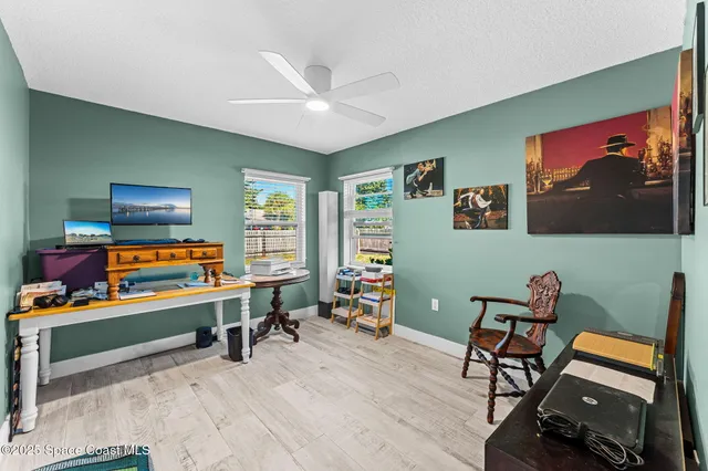 a room with furniture and air hockey table