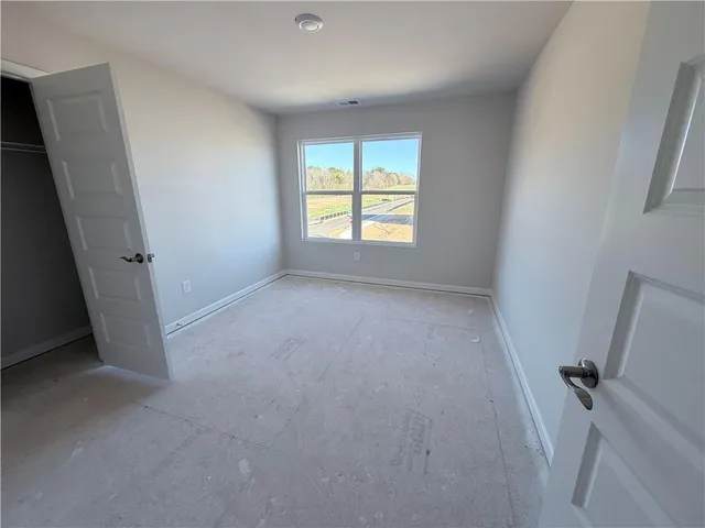 view of a room with wooden floor