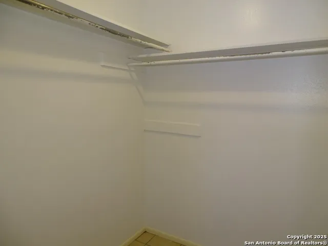 a view of a small space with a window