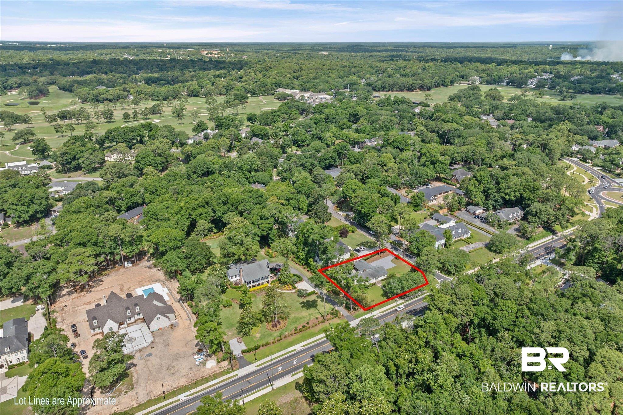 4 Turnout Lane Mobile, AL 36608 - Photo 47 of 53 Aerial perspective highlighting the property outlined in red, set amidst a verdant landscape with mature trees