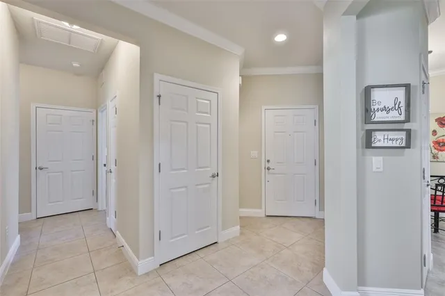 a kitchen with kitchen island granite countertop a sink and a counter space