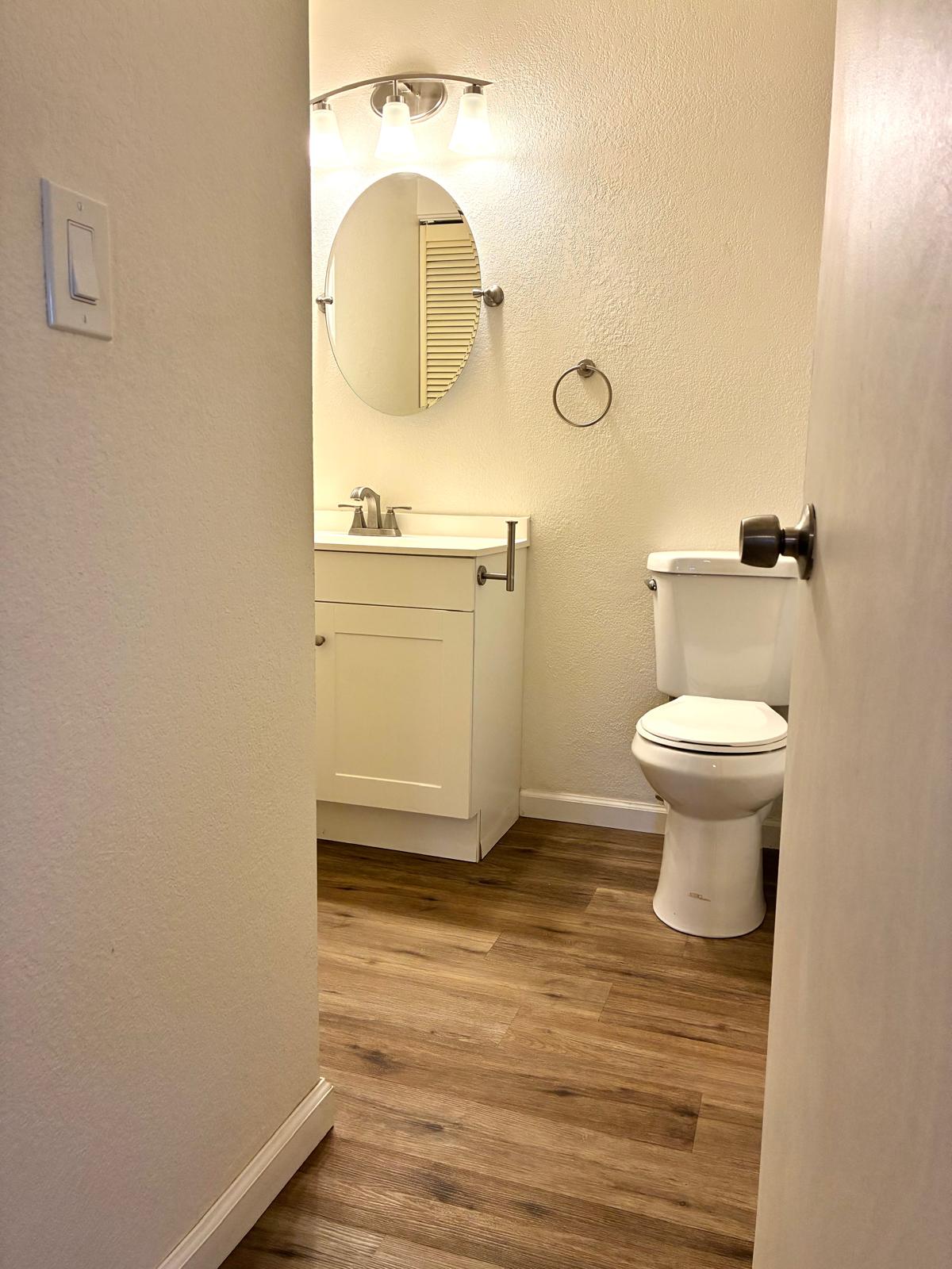 68-3883 Lua Kula Street, Unit 2102 Waikoloa, HI 96738 - Photo 18 of 21 a bathroom with a sink and a toilet