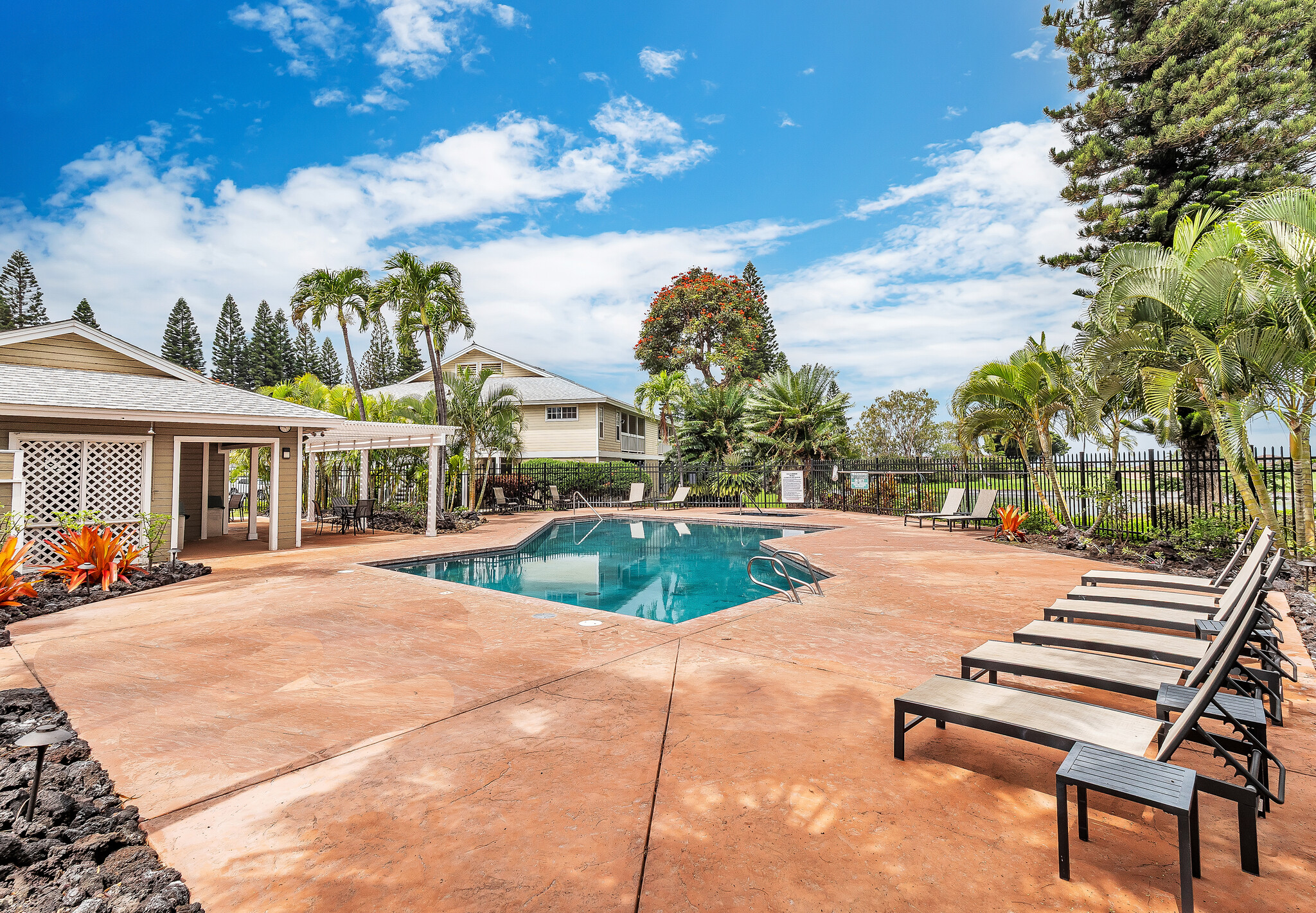68-3883 Lua Kula Street, Unit 2102 Waikoloa, HI 96738 - Photo 25 of 29 a view of a patio with swimming pool