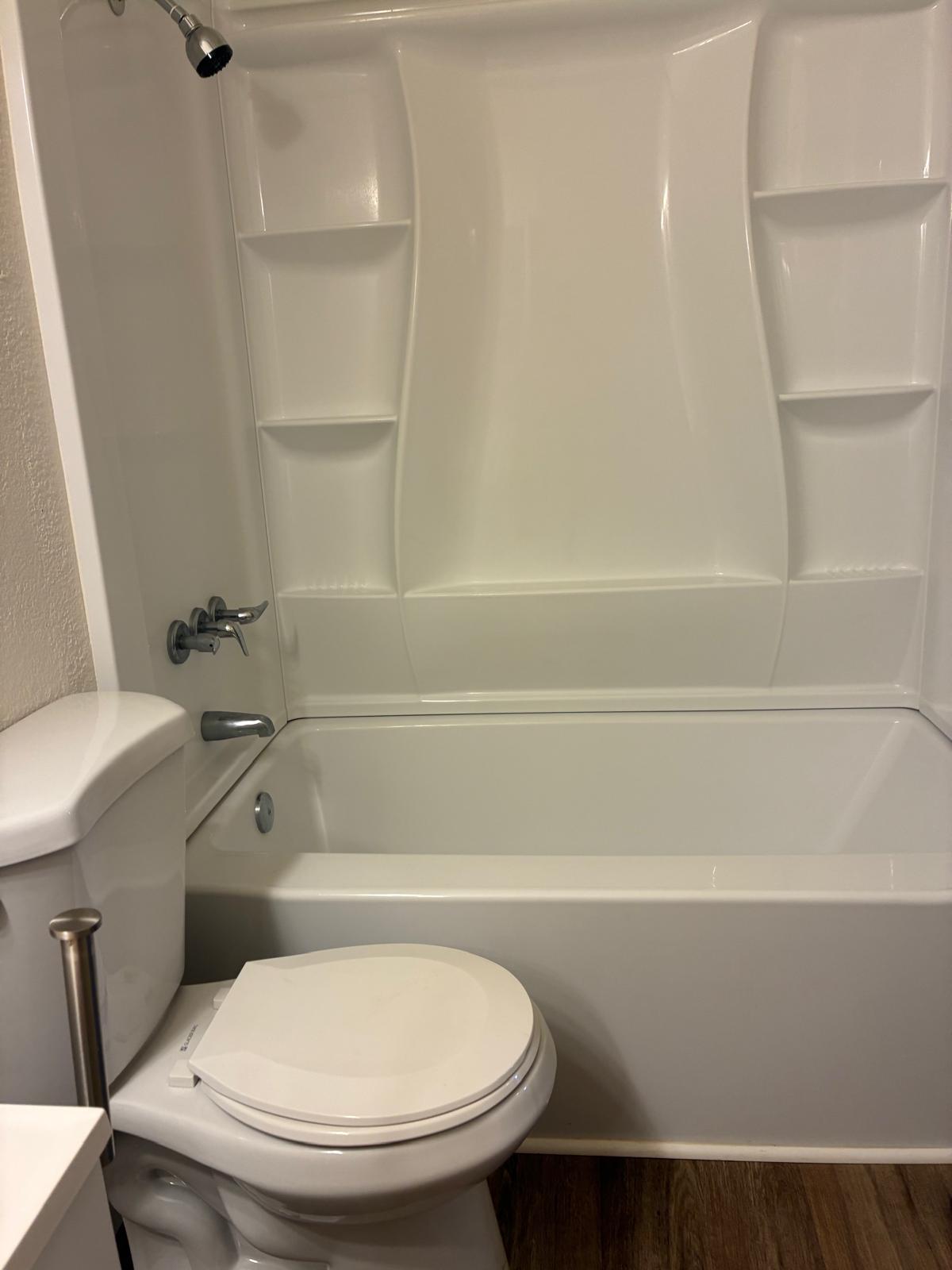 68-3883 Lua Kula Street, Unit 2102 Waikoloa, HI 96738 - Photo 6 of 21 a bathroom with a toilet and a shower