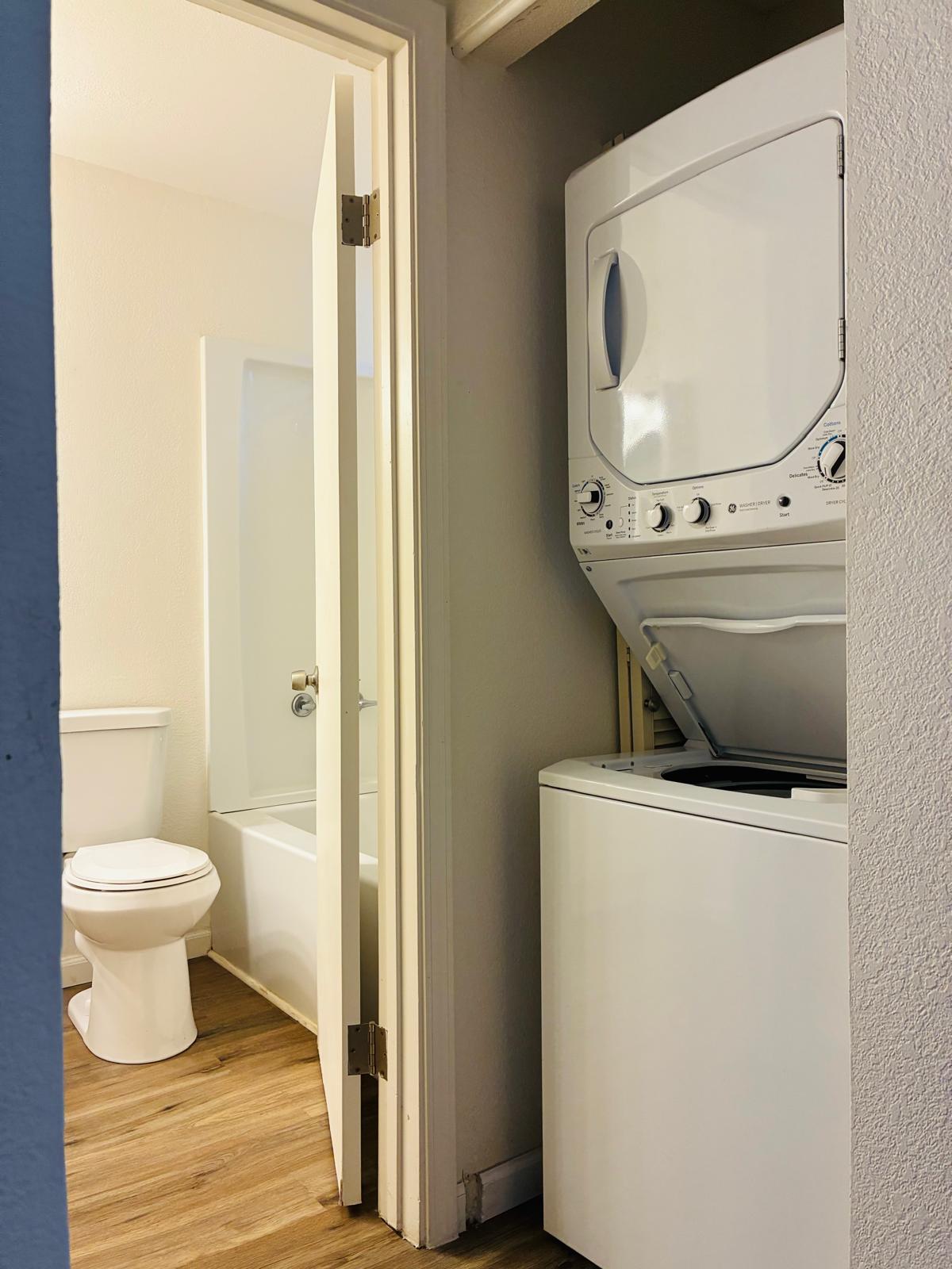 68-3883 Lua Kula Street, Unit 2102 Waikoloa, HI 96738 - Photo 9 of 21 a bathroom with a toilet and a mirror