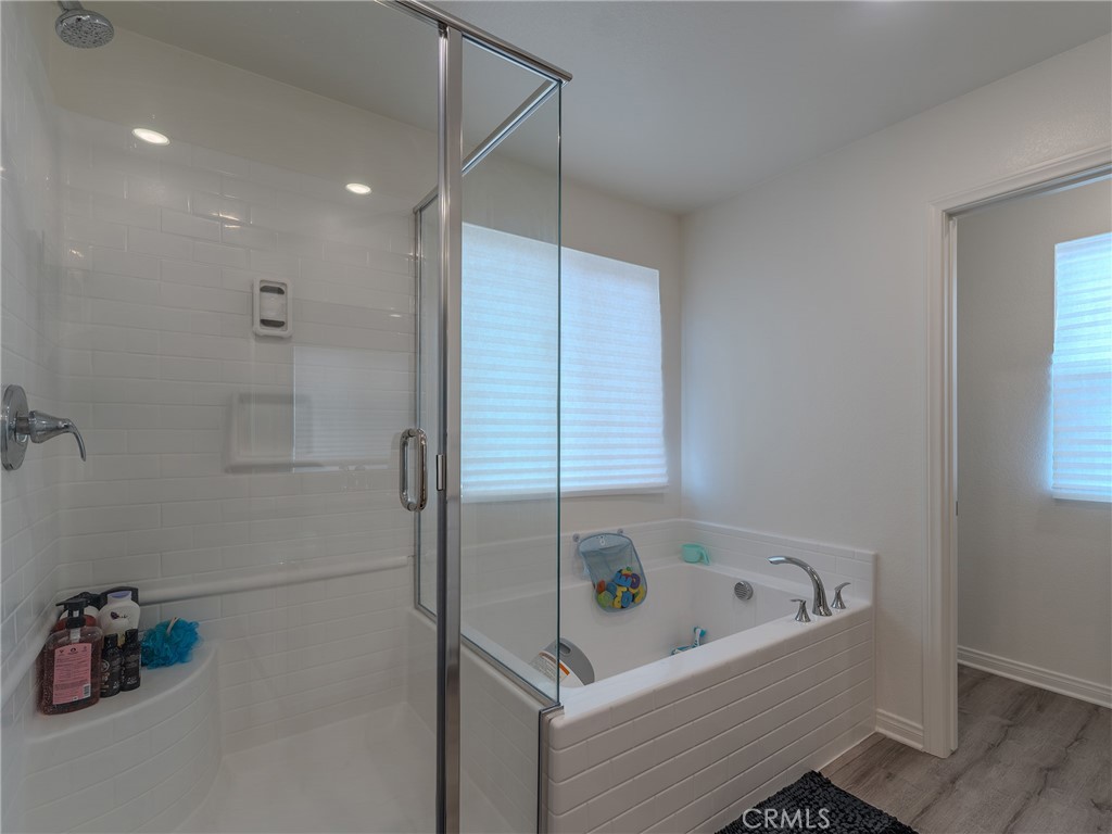 25602 Pne Rdg Road Homeland, CA 92548 - Photo 22 of 35 a bathroom with a bathtub and shower