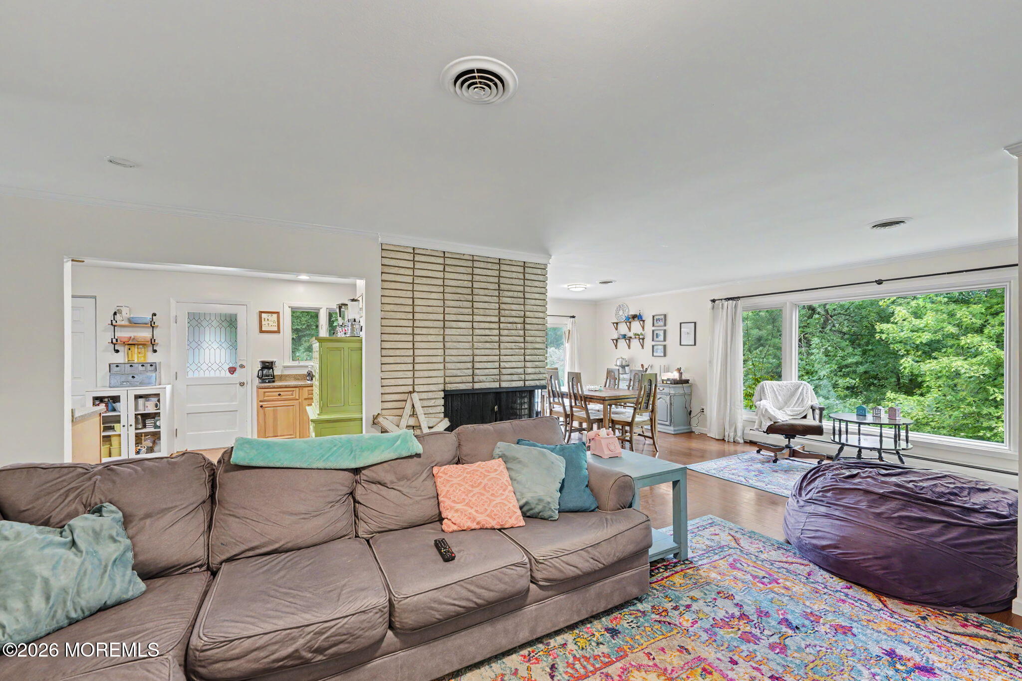 699 Aldrich Road Howell, NJ 07731 - Photo 12 of 30 a living room with furniture and a large window