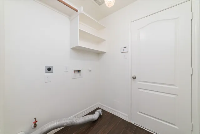 a view of small space with racks on the wall