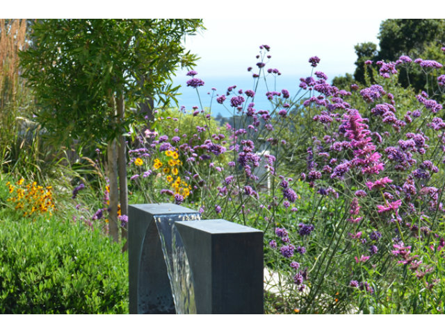 102 Las Lomas Drive Aptos, CA 95003 - Photo 20 of 25 a view of flowers in back yard of a house