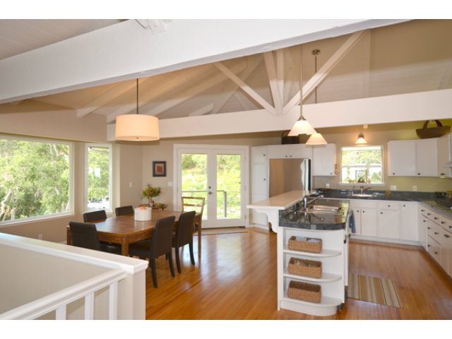 102 Las Lomas Drive Aptos, CA 95003 - Photo 2 of 25 a kitchen with a dining table chairs and large window