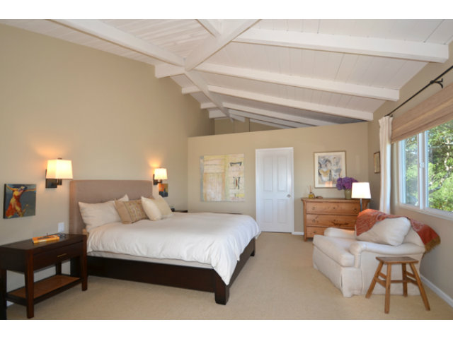 102 Las Lomas Drive Aptos, CA 95003 - Photo 5 of 25 a bedroom with a bed and a couch