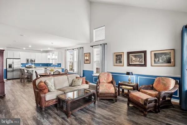 a living room with furniture and a table