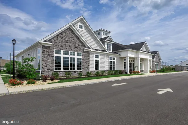 front view of a house with a small yard