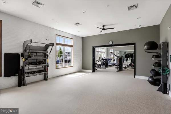 a view of a livingroom with furniture and closet