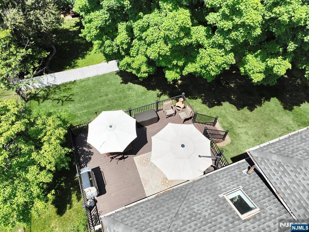 30 Brookfield Road Dumont, NJ 07628 - Photo 45 of 50 an aerial view of a house with a yard and lake view