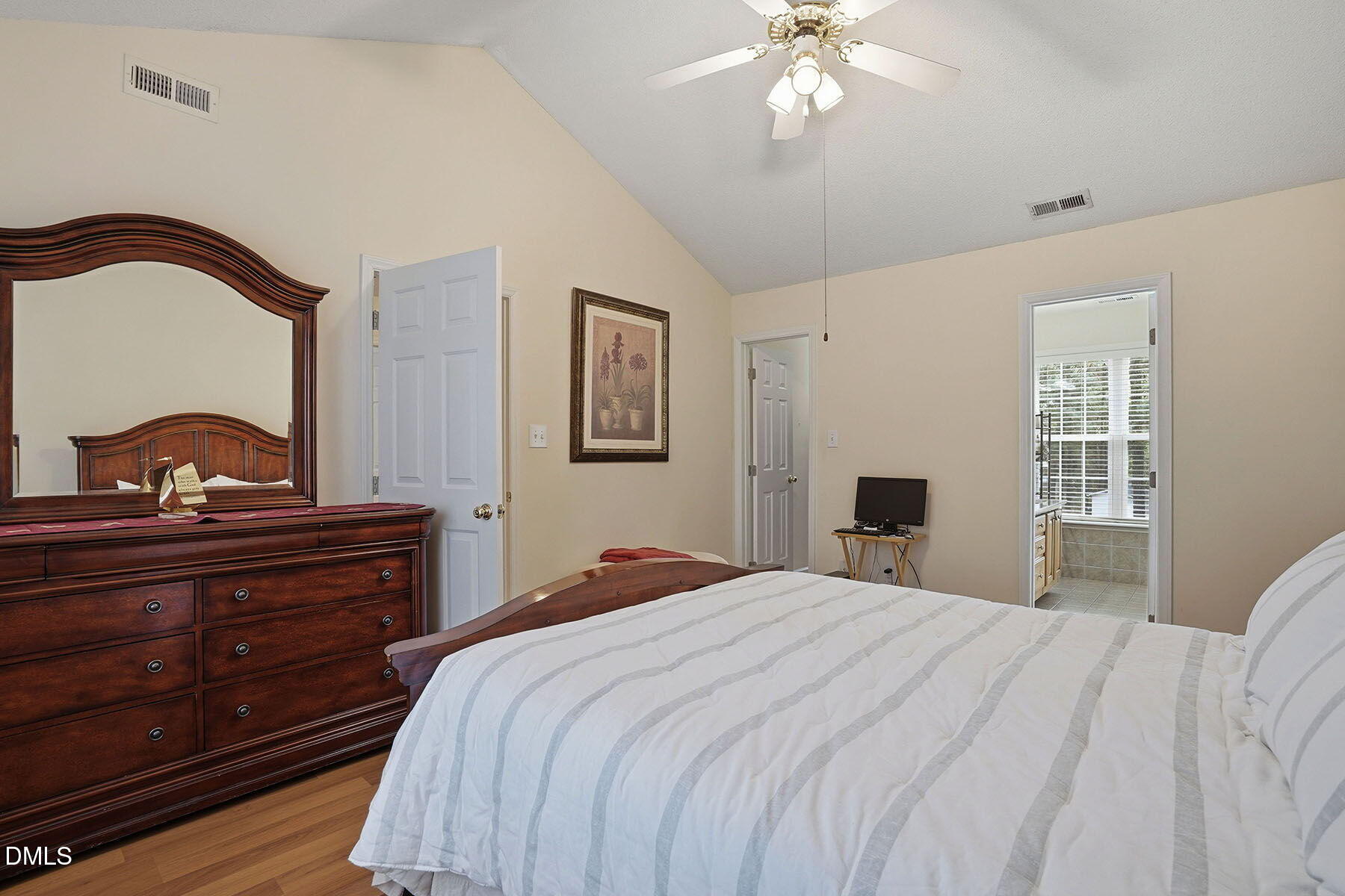 317 Atkinson Farm Circle Garner, NC 27529 - Photo 18 of 29 a bedroom with a bed and a window