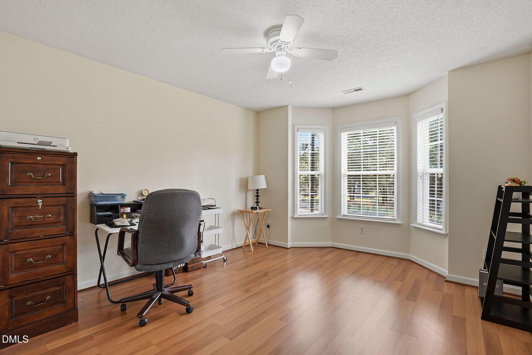 317 Atkinson Farm Circle Garner, NC 27529 - Photo 21 of 29 a view of a workspace with furniture and a window