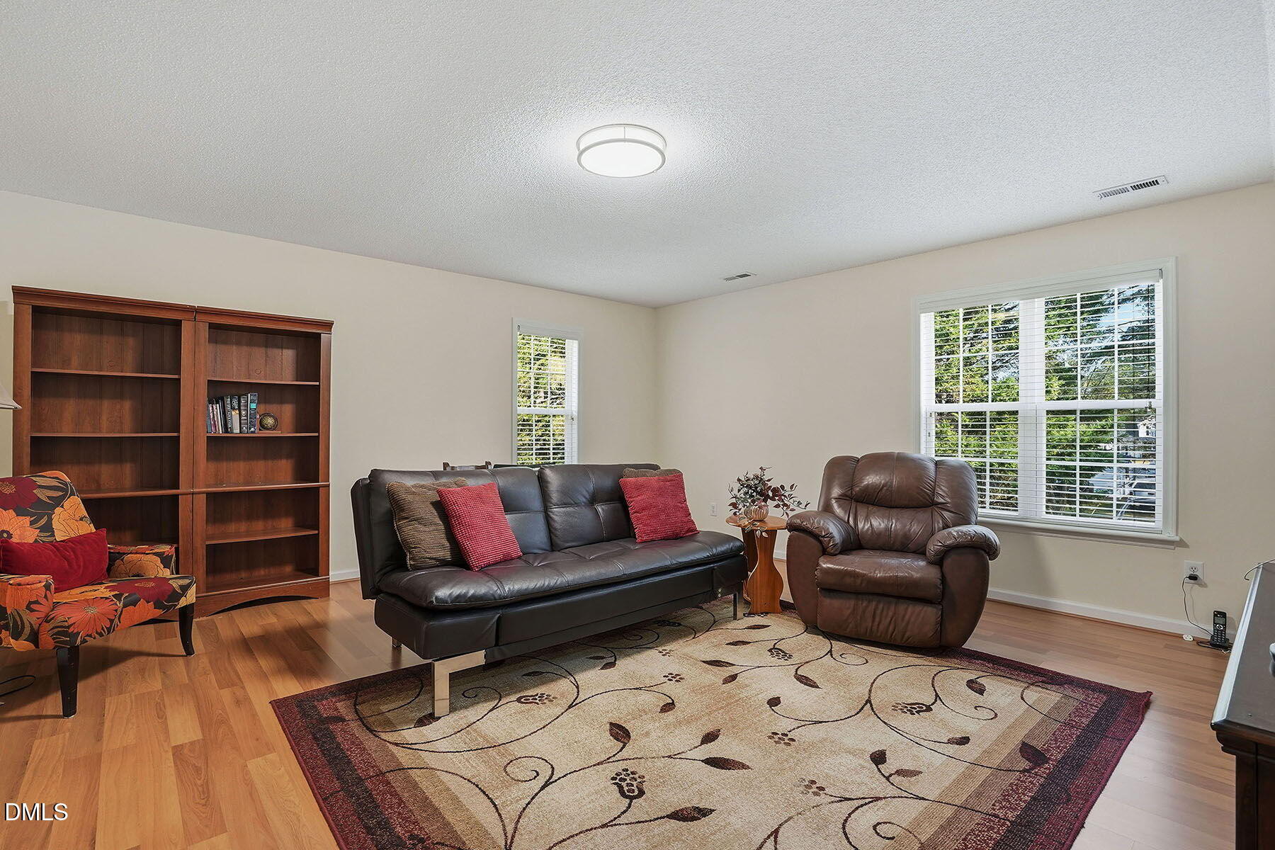 317 Atkinson Farm Circle Garner, NC 27529 - Photo 23 of 29 a living room with furniture and a couch