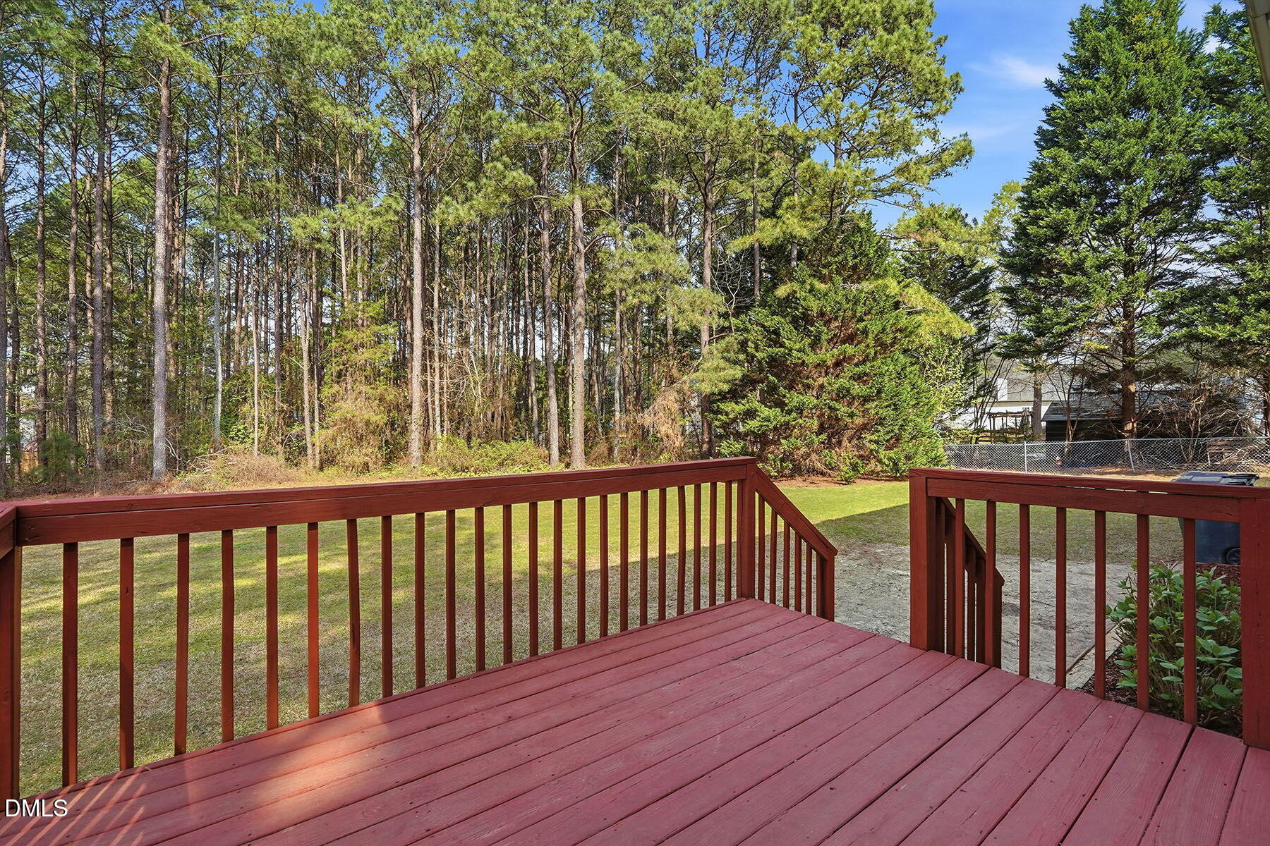 317 Atkinson Farm Circle Garner, NC 27529 - Photo 25 of 29 a balcony with wooden floor and fence
