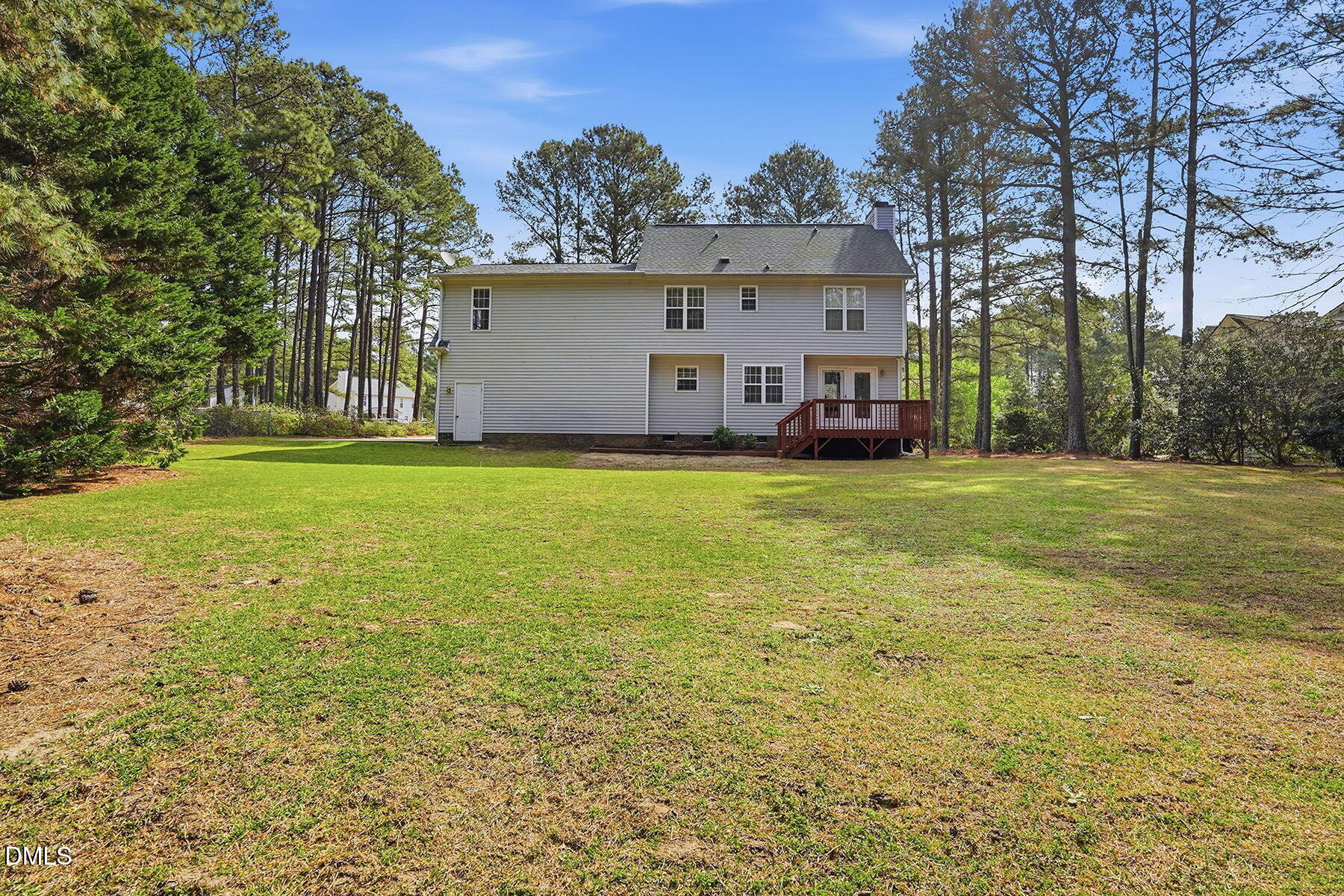 317 Atkinson Farm Circle Garner, NC 27529 - Photo 27 of 29 a view of a house with a yard and garage