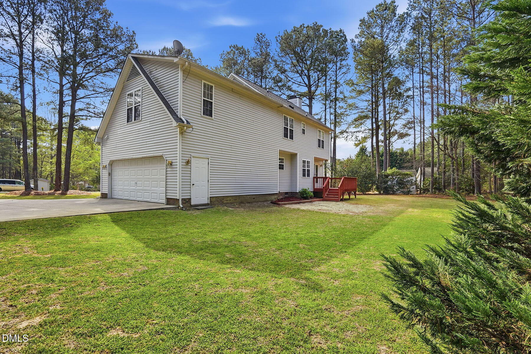 317 Atkinson Farm Circle Garner, NC 27529 - Photo 28 of 29 a front view of house with yard and trees