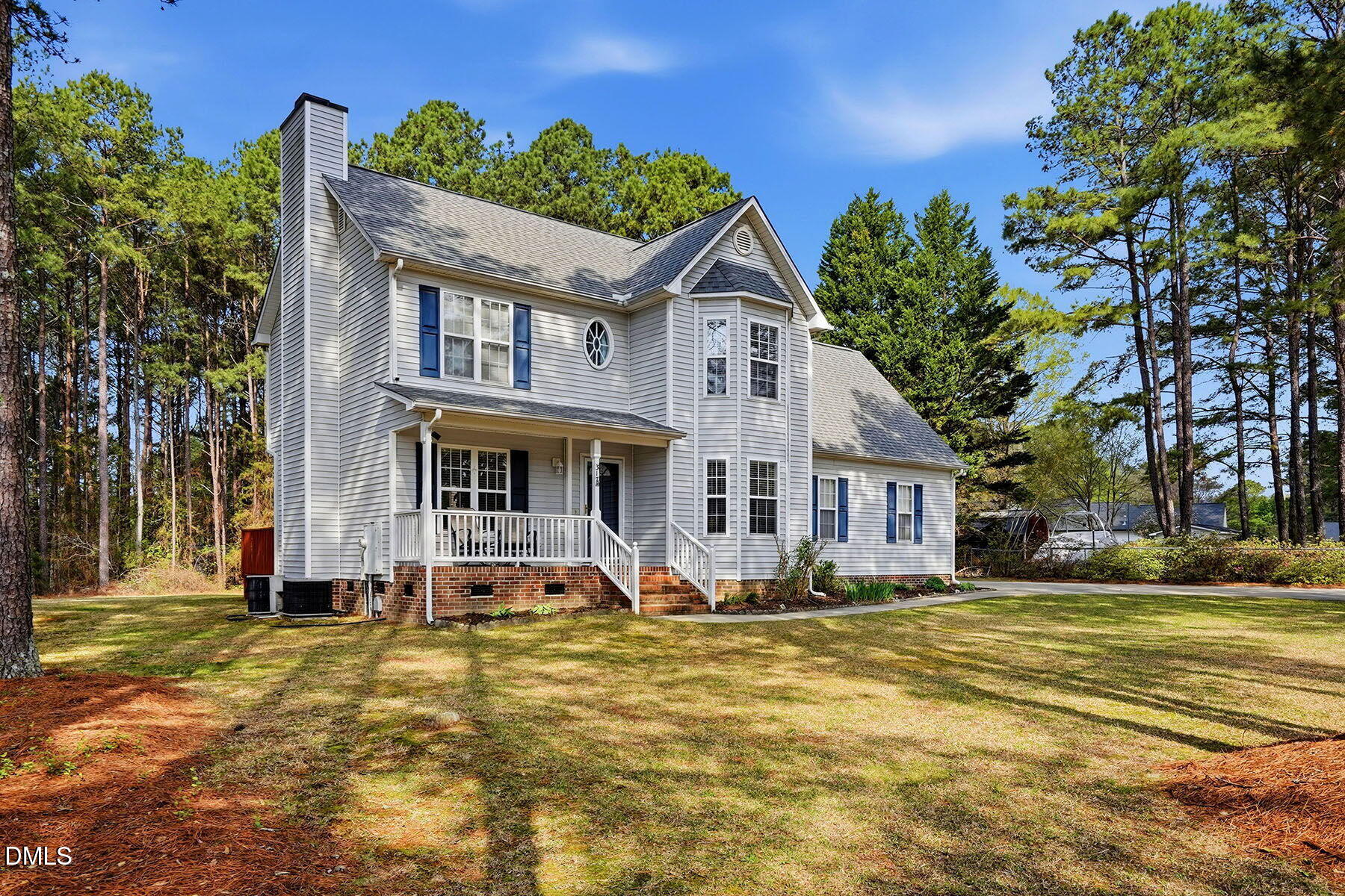 317 Atkinson Farm Circle Garner, NC 27529 - Photo 3 of 29 a front view of a house with a yard