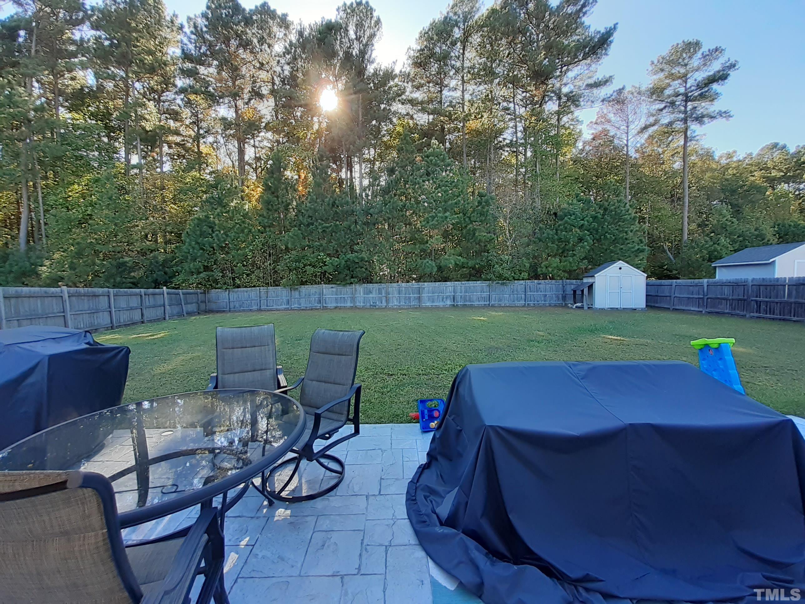 209 Lodestone Drive Durham, NC 27703 - Photo 3 of 30 a view of a chairs and table in the patio