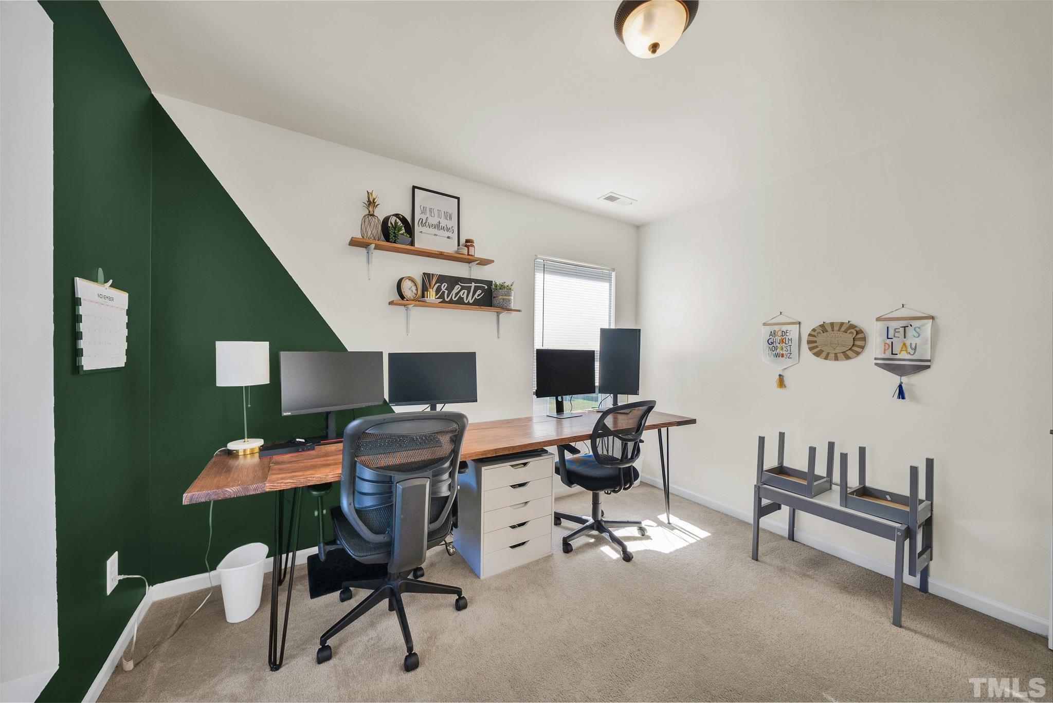 209 Lodestone Drive Durham, NC 27703 - Photo 25 of 30 a workspace with furniture and window