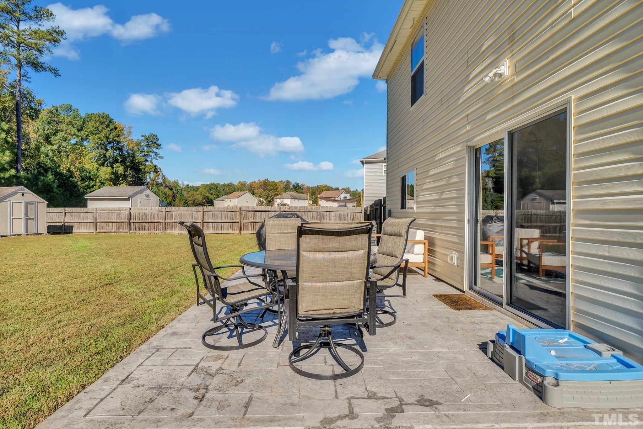 209 Lodestone Drive Durham, NC 27703 - Photo 27 of 30 a view of a chairs and table in the patio