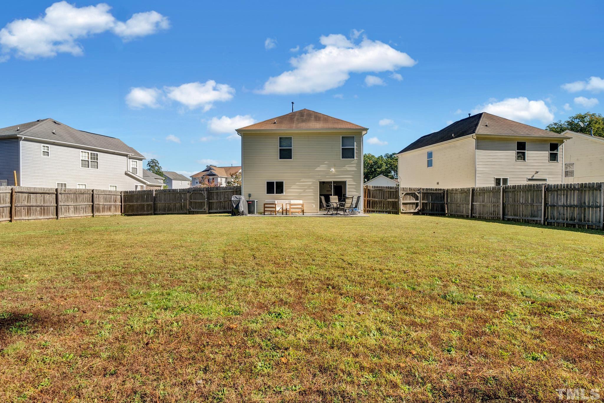 209 Lodestone Drive Durham, NC 27703 - Photo 29 of 30 a front view of a house with a yard