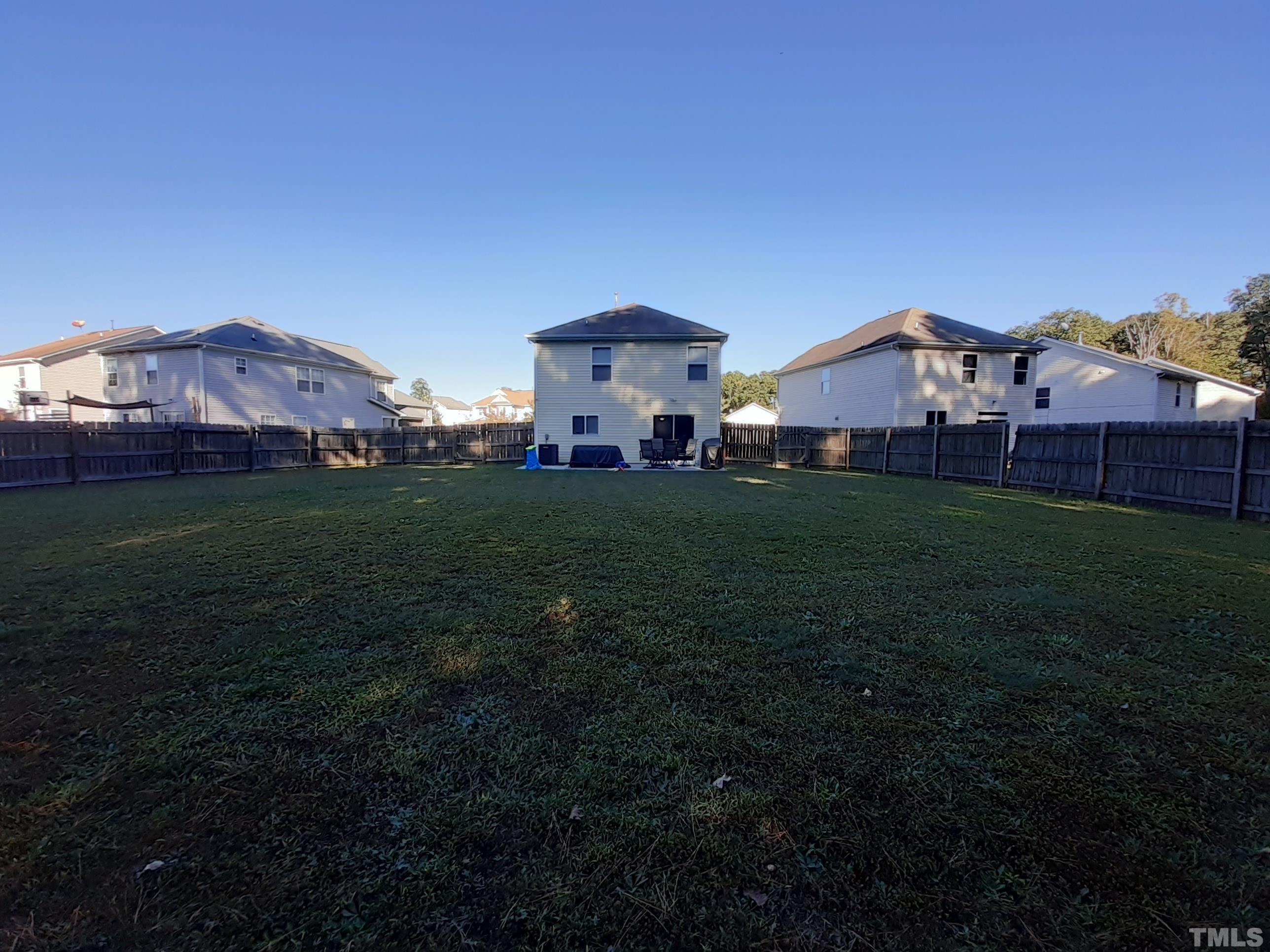 209 Lodestone Drive Durham, NC 27703 - Photo 4 of 30 a view of a house with a yard