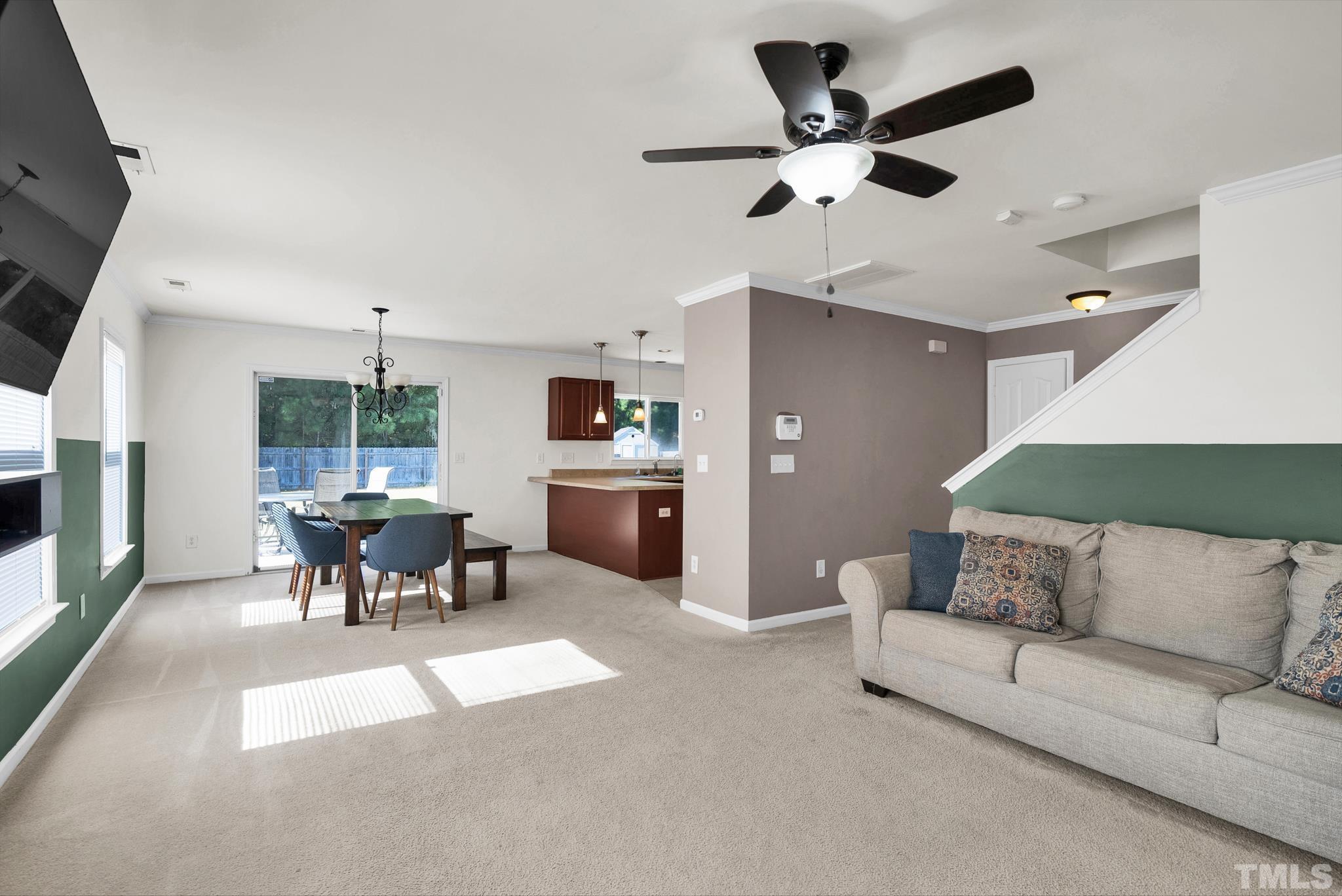 209 Lodestone Drive Durham, NC 27703 - Photo 5 of 30 a living room with furniture and a large window
