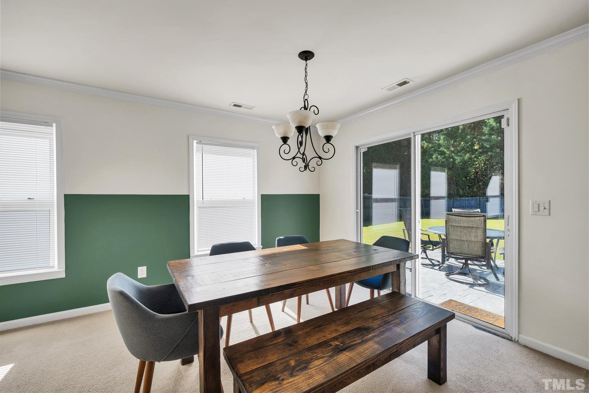 209 Lodestone Drive Durham, NC 27703 - Photo 8 of 30 a dining room with furniture and window