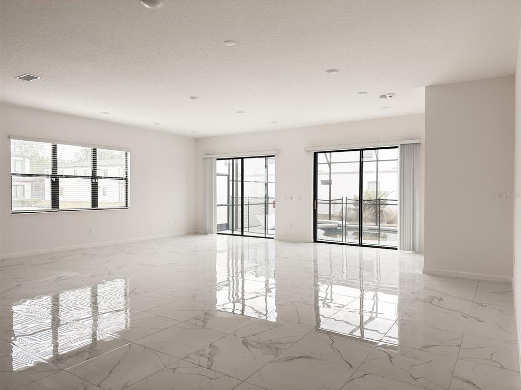 1291 Butterfly Orchid Road Davenport, FL 33837 - Photo 11 of 67