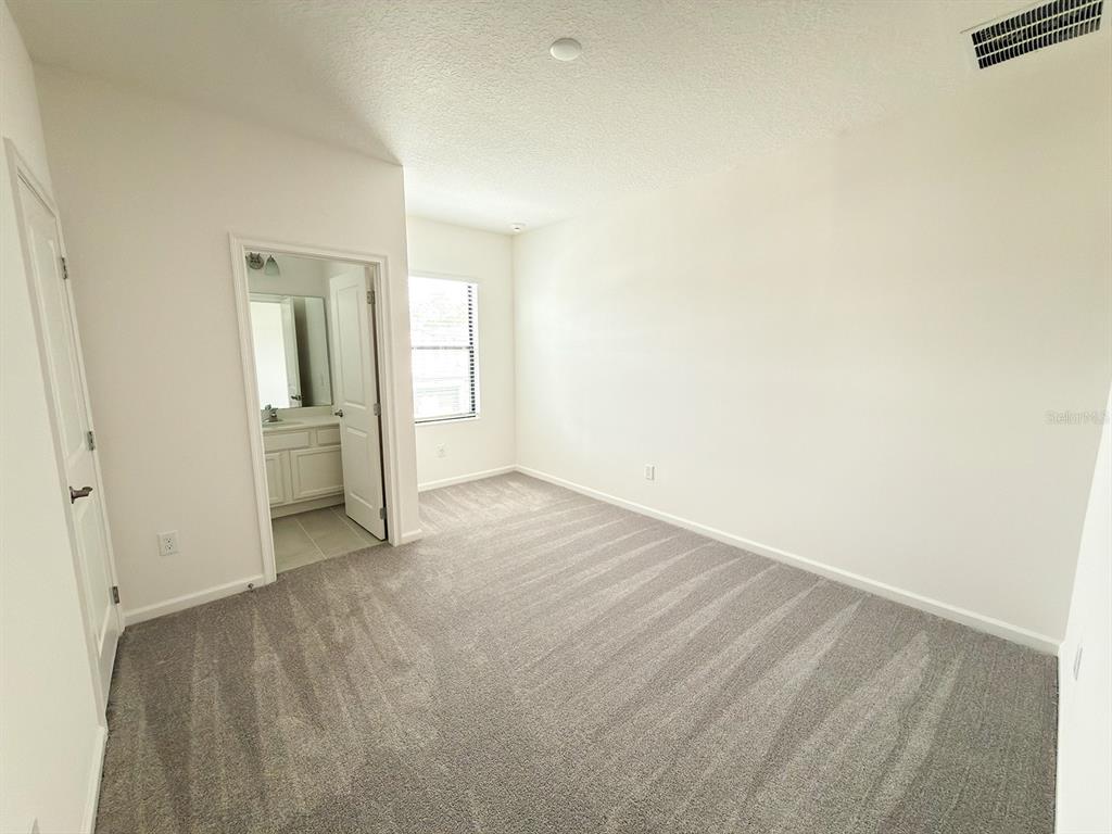 1291 Butterfly Orchid Road Davenport, FL 33837 - Photo 16 of 67