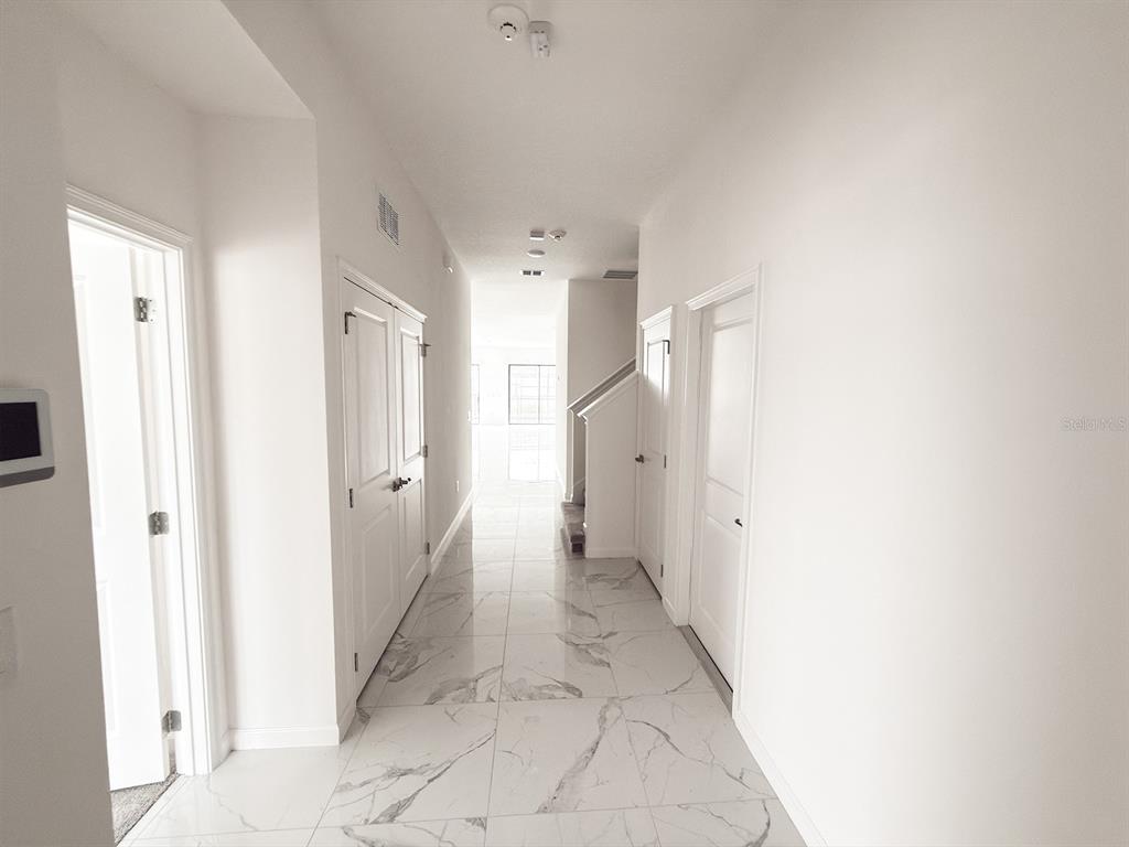 1291 Butterfly Orchid Road Davenport, FL 33837 - Photo 5 of 67