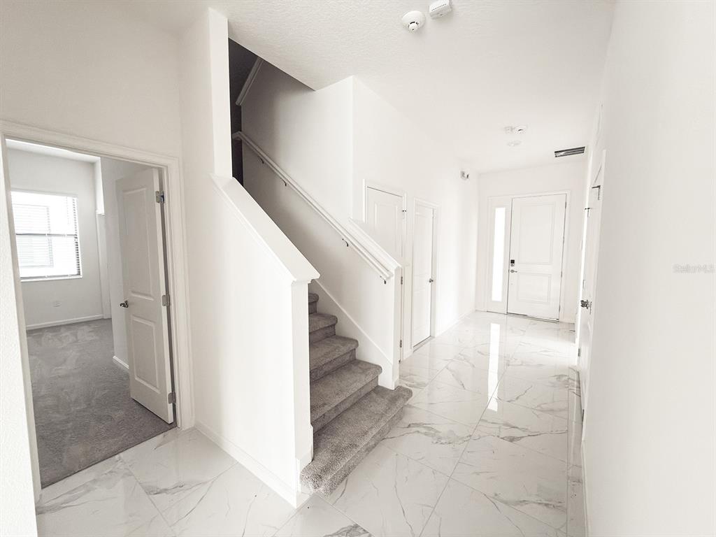 1291 Butterfly Orchid Road Davenport, FL 33837 - Photo 6 of 67