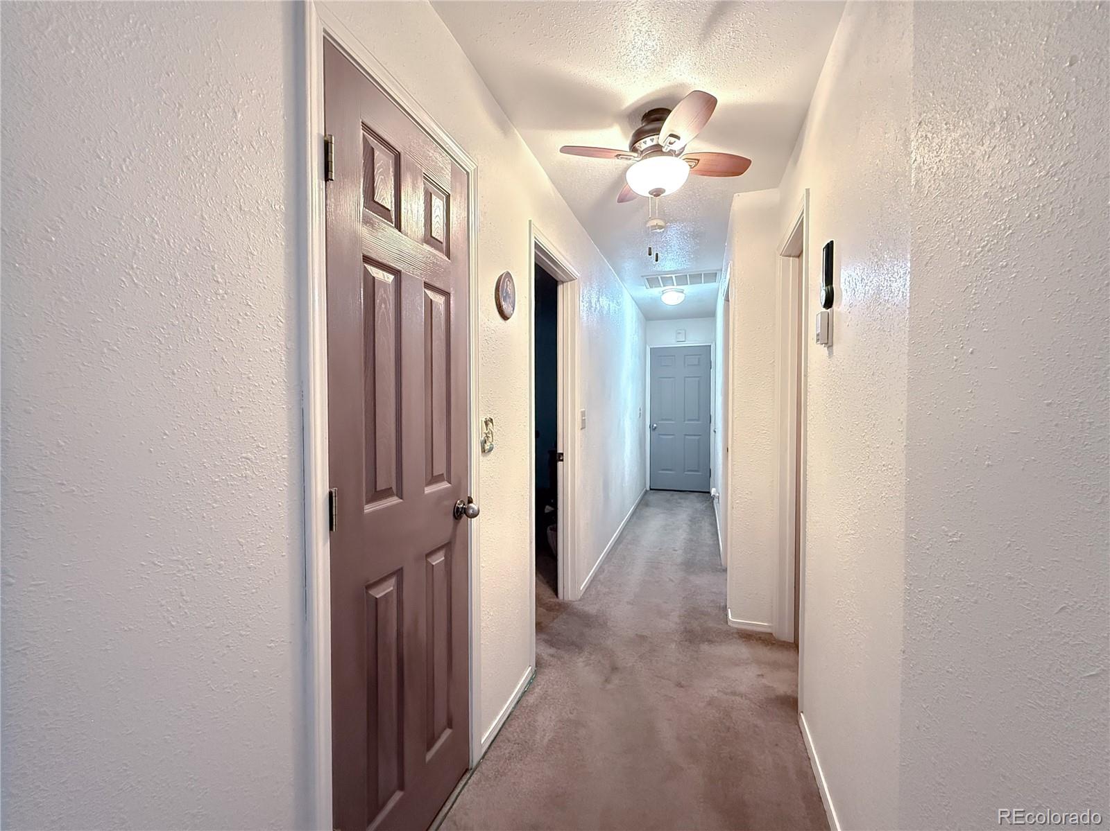 20899 County Rd L.7 San Luis, CO 81152 - Photo 12 of 36 a view of a hallway view with staircase