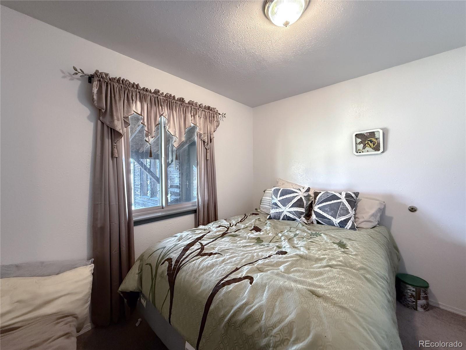 20899 County Rd L.7 San Luis, CO 81152 - Photo 18 of 36 a bedroom with a bed and a window