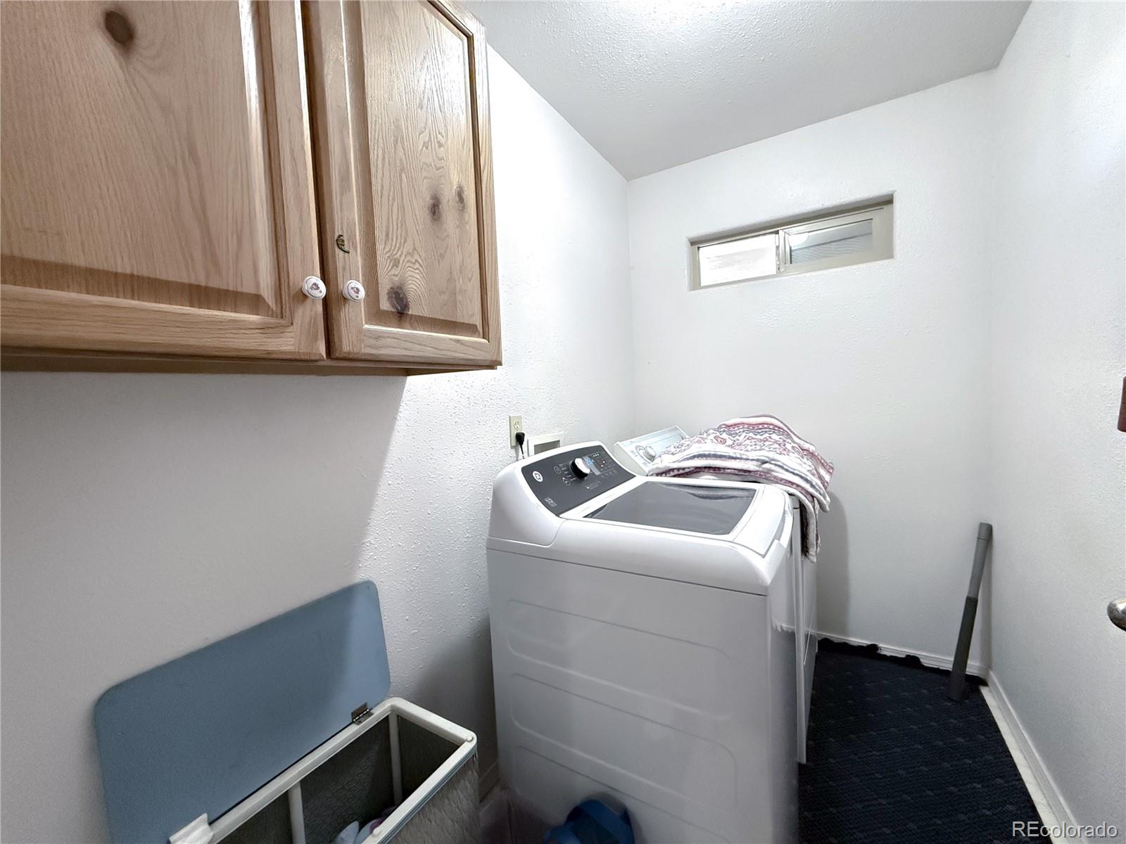 20899 County Rd L.7 San Luis, CO 81152 - Photo 22 of 36 a utility room with dryer and washer