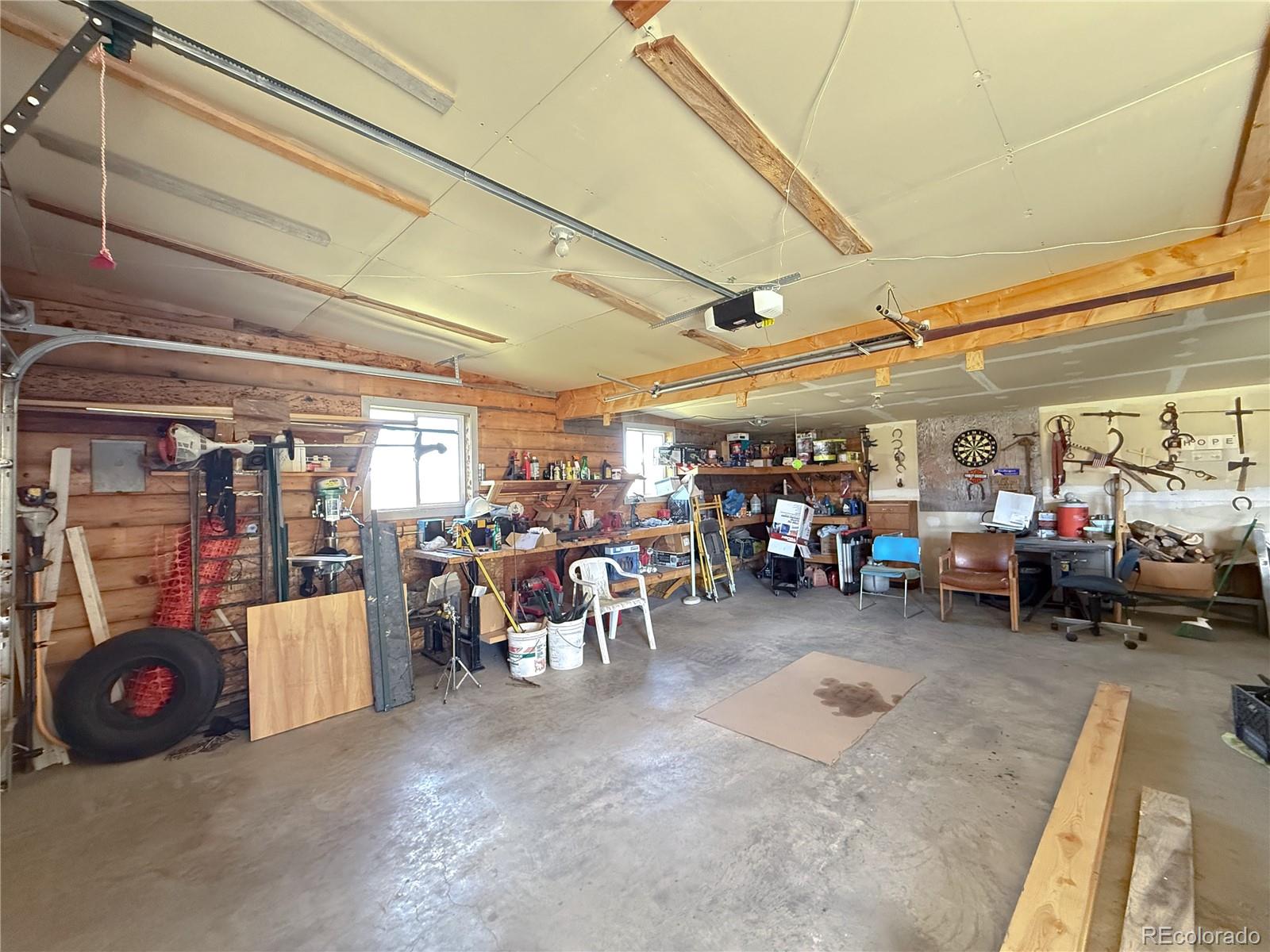 20899 County Rd L.7 San Luis, CO 81152 - Photo 32 of 36 a view of a garage with cars