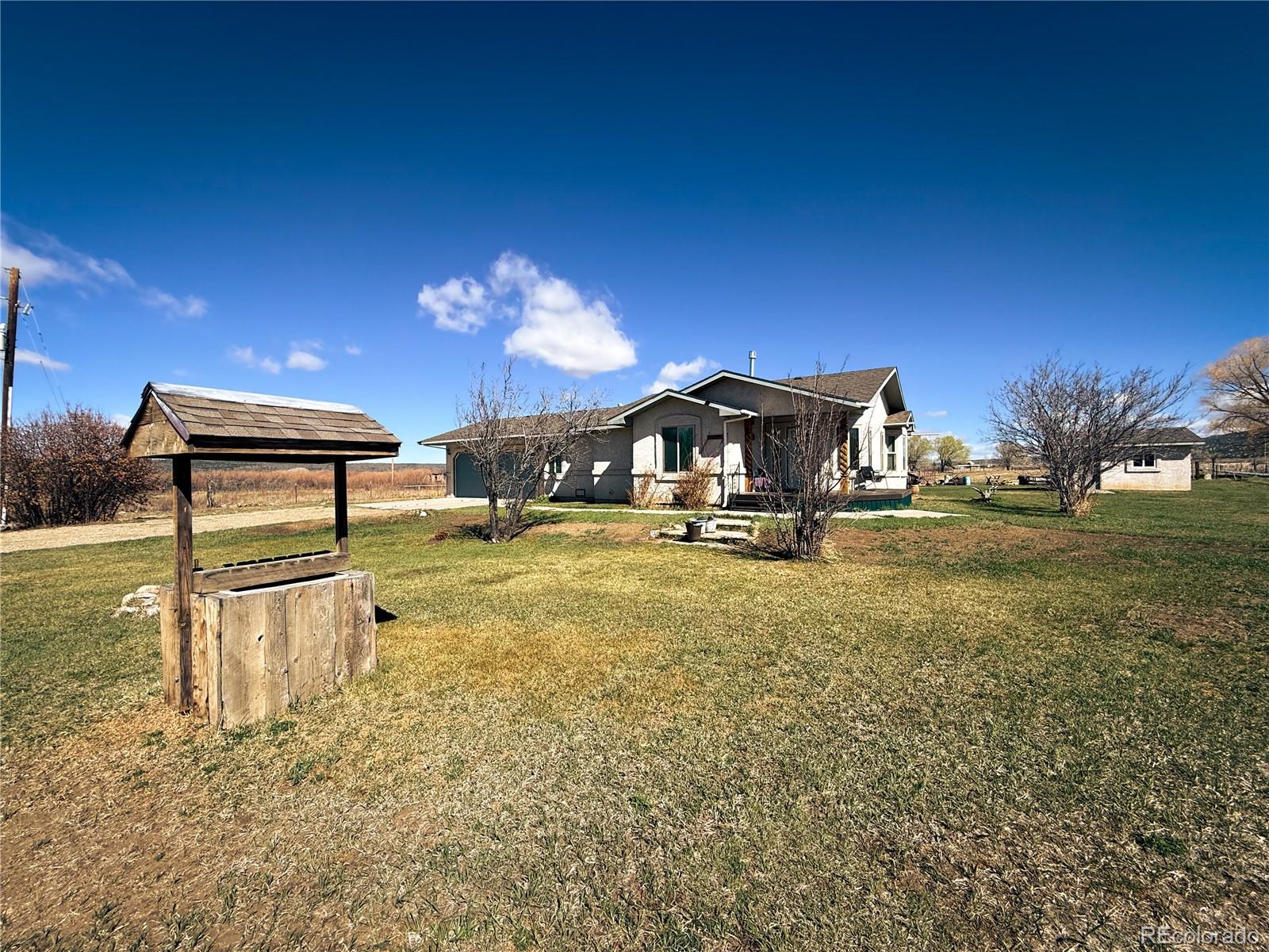 20899 County Rd L.7 San Luis, CO 81152 - Photo 36 of 36 a front view of a house with a yard
