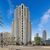 a view of a city with tall buildings