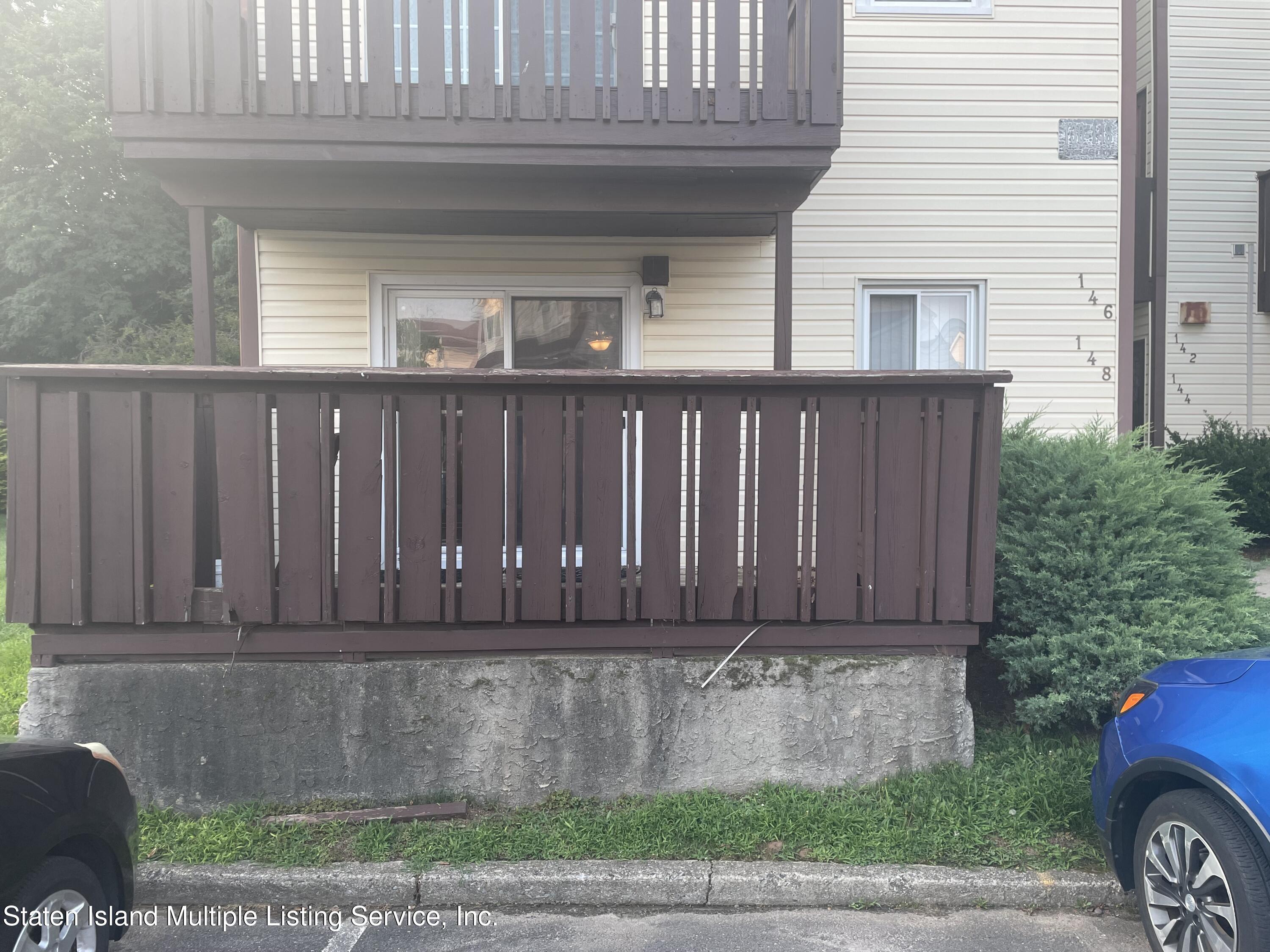 148 Timber Ridge Drive Staten Island, NY 10306 - Photo 1 of 7 A410BE04-8439-4249-A3E8-39CE9E9C9DD4