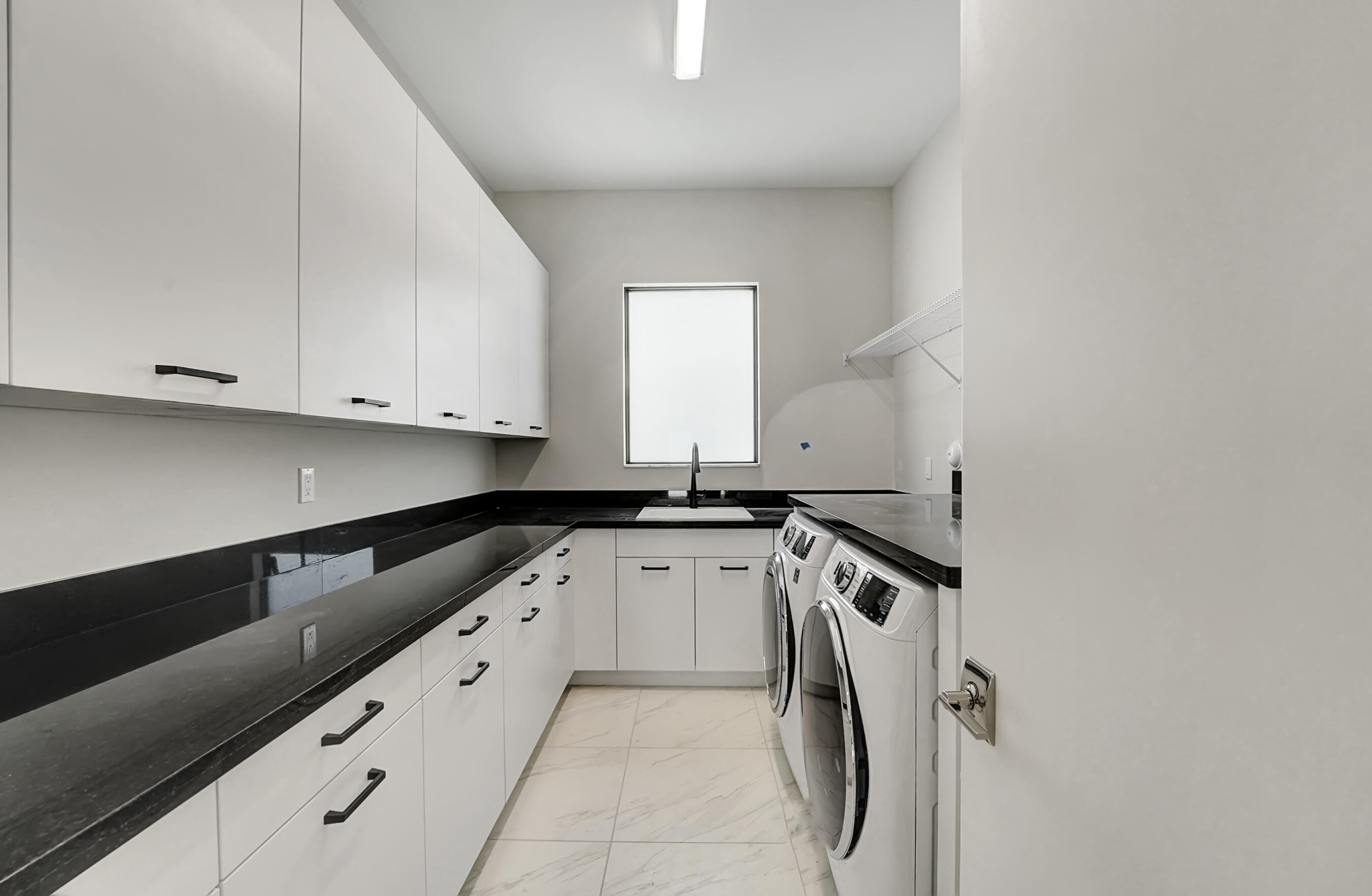 17048 Cappuccino Way Boca Raton, FL 33496 - Photo 28 of 43 laundry