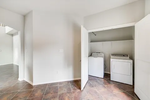 a view of utility room with washer and dryer
